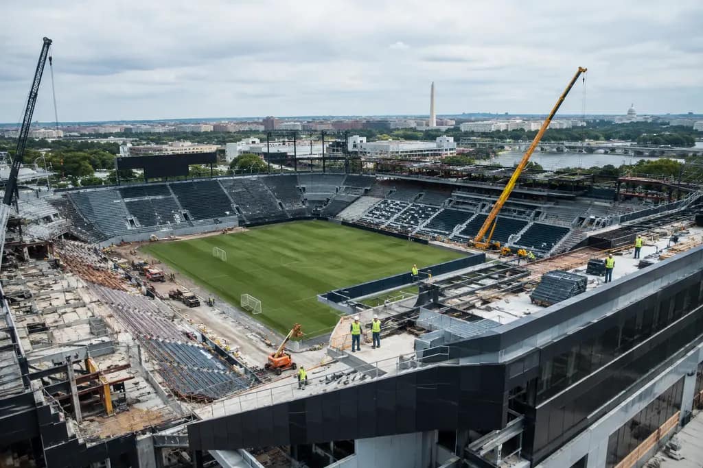 Audi Field Renovation concept with a roofed soccer venue and nearby transit access